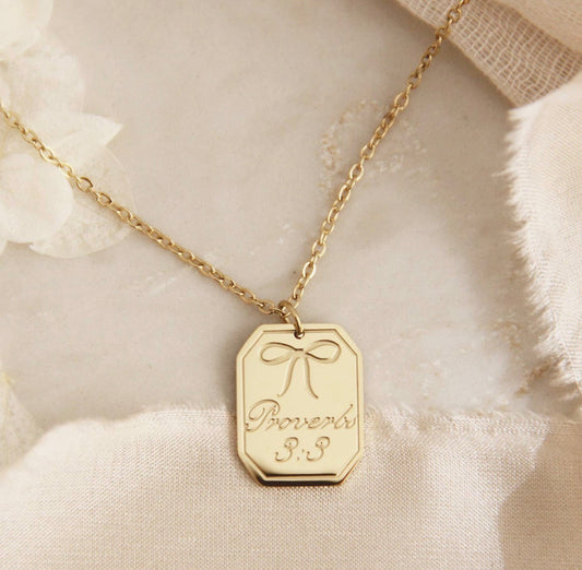 Proverbs 3:3 Bow Necklace
